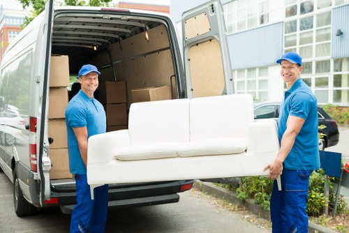 Van moving team preparing safely for a removal job