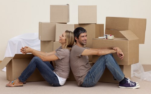 Careful loading of household items into a moving van