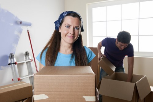 Unpacking services helping a family settle into a new home