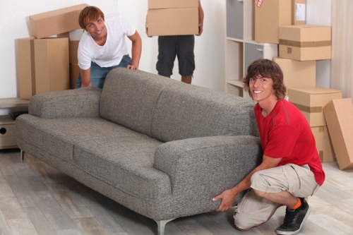 Furniture and boxes being loaded for a Riddlesdown removal service