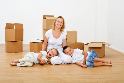 Professional house moving process with careful packing and transport